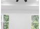 Close up shot of ceiling detail with fan and tray ceiling at 2131 Brighton Ln, Orlando, FL 32817