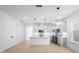 Modern kitchen with stainless steel appliances, a center island, stylish pendant lights, and ample cabinet space at 2131 Brighton Ln, Orlando, FL 32817