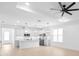 Open living area with kitchen and ceiling fan at 2131 Brighton Ln, Orlando, FL 32817