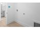 Spacious laundry room with white walls and hookups at 2131 Brighton Ln, Orlando, FL 32817