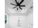 Bright, spacious bedroom featuring a ceiling fan, two windows, and ensuite bathroom at 2131 Brighton Ln, Orlando, FL 32817