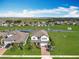 Stunning aerial view of home, lake, and community at 2312 Panoramic Cir, Apopka, FL 32703