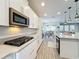 Well-equipped kitchen with sleek cabinetry and stainless steel appliances at 2312 Panoramic Cir, Apopka, FL 32703