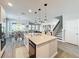 Modern kitchen with island, stainless steel appliances, and pendant lighting at 2312 Panoramic Cir, Apopka, FL 32703