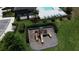 Aerial view of a well-maintained community playground with slides and climbing structure, surrounded by green space at 2312 Panoramic Cir, Apopka, FL 32703