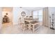Cozy dining area with a modern table, neutral walls, tile flooring, and lots of natural light at 237 Church St, Lake Helen, FL 32744