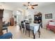 Spacious dining room that leads to the living room with a chandelier above the dining table at 249 Mill Slough Rd, Oviedo, FL 32766