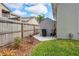 The side yard features a storage shed, gravel, and a wood fence, providing functional space and backyard privacy at 249 Mill Slough Rd, Oviedo, FL 32766