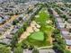 Beautiful aerial view of a golf course, sand traps, and community homes at 2498 Saint Augustine Blvd, Haines City, FL 33844