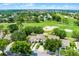 An aerial view of a golf course community with manicured green lawns at 2498 Saint Augustine Blvd, Haines City, FL 33844
