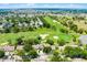 Scenic aerial shot of residential real estate backing up to golf course at 2498 Saint Augustine Blvd, Haines City, FL 33844