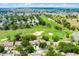 Overhead view of real estate backing up to a manicured golf course at 2498 Saint Augustine Blvd, Haines City, FL 33844