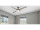Bedroom featuring a modern ceiling fan and natural light streaming through windows at 2756 Summerfield Rd, Winter Park, FL 32792