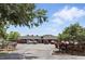 Exterior view of the community clubhouse showcasing ample parking and sign for Winter Park Pines at 2756 Summerfield Rd, Winter Park, FL 32792