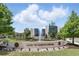 View of the Center for Health and Wellbeing featuring a fountain and beautifully landscaped entrance at 2756 Summerfield Rd, Winter Park, FL 32792