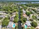 Aerial view of the neighborhood with access to canals and a lake at 2859 T C U Blvd, Orlando, FL 32817
