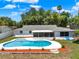 Gorgeous pool and backyard with manicured landscaping in a tranquil setting at 2859 T C U Blvd, Orlando, FL 32817