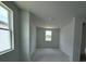 Bright hallway featuring bright walls and two bright windows at 30155 Rustic Mill Street, Mount Dora, FL 32757
