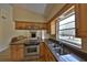 Inviting kitchen with granite countertops, stainless steel appliances, and plenty of cabinet space at 309 Panama Cir, Winter Springs, FL 32708