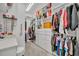 Spacious walk-in closet with lots of shelves and storage options at 3149 Songbird Cir, Harmony, FL 34773