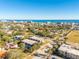 Wide aerial perspective featuring townhouses with ocean view and a city skyline in the background at 315 Glenview Blvd # 3, Daytona Beach, FL 32118