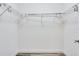 Walk-in closet with base trim, gray floors, and white walls at 315 Glenview Blvd # 3, Daytona Beach, FL 32118