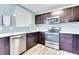 Modern kitchen featuring stainless steel appliances, dark cabinets, tiled backsplash, and a stainless steel dishwasher at 315 Glenview Blvd # 3, Daytona Beach, FL 32118
