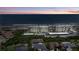 Aerial view of the building showcasing its beachfront location with stunning ocean views at 3180 Ocean Shore Blvd # 407, Ormond Beach, FL 32176