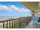 Relax on this beautiful balcony with ocean views and comfortable seating at 3180 Ocean Shore Blvd # 407, Ormond Beach, FL 32176