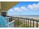 This spacious balcony with seating is perfect for relaxing and enjoying the ocean view at 3180 Ocean Shore Blvd # 407, Ormond Beach, FL 32176