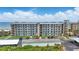 Beautiful beachfront condo building with ample parking, offering stunning ocean views and convenient beach access at 3180 Ocean Shore Blvd # 407, Ormond Beach, FL 32176