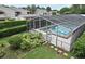 Private screened-in pool with lush landscaping at 320 Lakeview St # 208, Orlando, FL 32804
