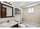 The well-lit bathroom features a tub/shower combo, and a vanity sink at 327 Ketch Ct, Orlando, FL 32835