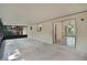 A spacious screened patio with a sliding glass door into the home at 327 Ketch Ct, Orlando, FL 32835