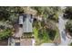 Aerial view of a single Gathering house with green backyard at 35724 Dawn Dr, Leesburg, FL 34788