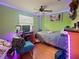 Cozy bedroom with eclectic LED lighting at 35724 Dawn Dr, Leesburg, FL 34788