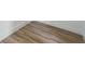 Close-up view of beautiful wood-look floors adds warmth and style to any room at 459 Cinnamon Dr, Kissimmee, FL 34759