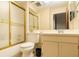 Bright bathroom featuring a shower, sink, cabinet and white fixtures at 4652 Oak Arbor Cir, Orlando, FL 32808