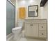 Clean bathroom with a shower, a vanity with storage, and modern fixtures at 4652 Oak Arbor Cir, Orlando, FL 32808
