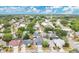 Aerial view of a residential neighborhood with tree-lined streets and well-maintained homes at 468 Wexdon Ct, Lake Mary, FL 32746
