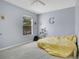 Bedroom features a gray color scheme, a window, and carpeted floors at 468 Wexdon Ct, Lake Mary, FL 32746