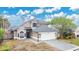 Charming two-story home with a well-maintained lawn and large driveway at 468 Wexdon Ct, Lake Mary, FL 32746
