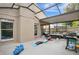 Spacious enclosed patio featuring neutral tones, plenty of room for activities and outdoor furniture at 468 Wexdon Ct, Lake Mary, FL 32746