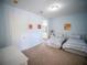 Bright bedroom with twin beds, light walls, and easy access to the bathroom at 4816 Cayview Ave # 20111, Orlando, FL 32819