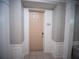 Apartment 201 entrance with neutral wall color and white trim at 4816 Cayview Ave # 20111, Orlando, FL 32819