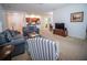 Open concept living room area leading to the kitchen, complete with neutral colors at 4816 Cayview Ave # 20111, Orlando, FL 32819