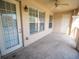 View of the charming covered patio area, great for relaxing with a ceiling fan and sunny exposure at 4816 Cayview Ave # 20111, Orlando, FL 32819