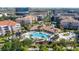 Aerial view of the community pool and recreation area with lounge chairs and play area at 4816 Cayview Ave # 20111, Orlando, FL 32819