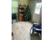 Inviting bonus room featuring tile floors and views from the exterior entrance and window at 4843 Pierce Arrow Dr, Apopka, FL 32712