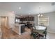 Modern kitchen and dining area with stainless steel appliances and ample counter space for cooking and entertaining at 490 Pentas Ln, Haines City, FL 33844